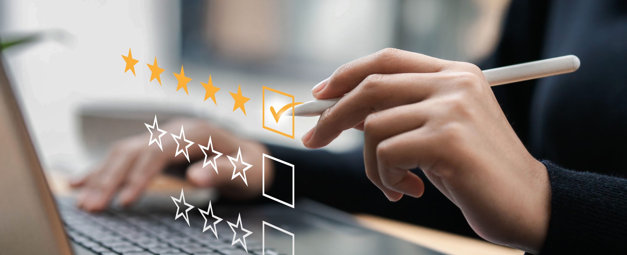 Businessman typing on a computer keyboard, customer service satisfaction survey concept. Business people choose the highest satisfaction rating and give 5 stars. Satisfaction, rating, rating.